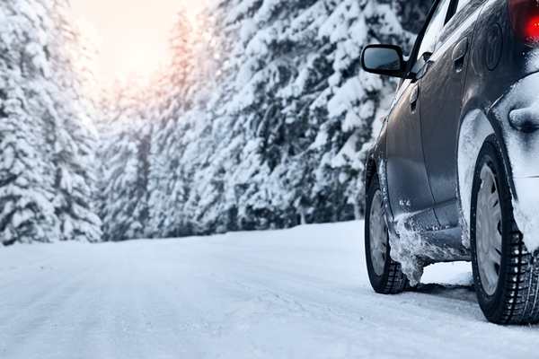 Car driving on snowy road