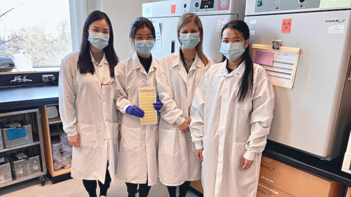 BCCDC Public Health Laboratory staff standing in lab