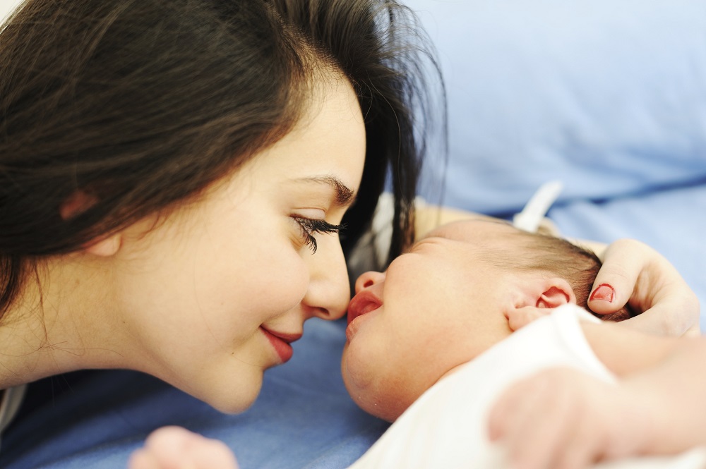 Happy mom with baby