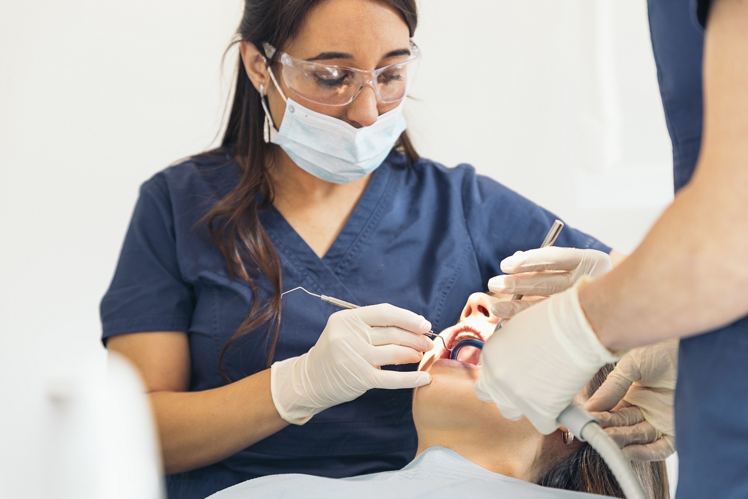 Dentist examining a patient