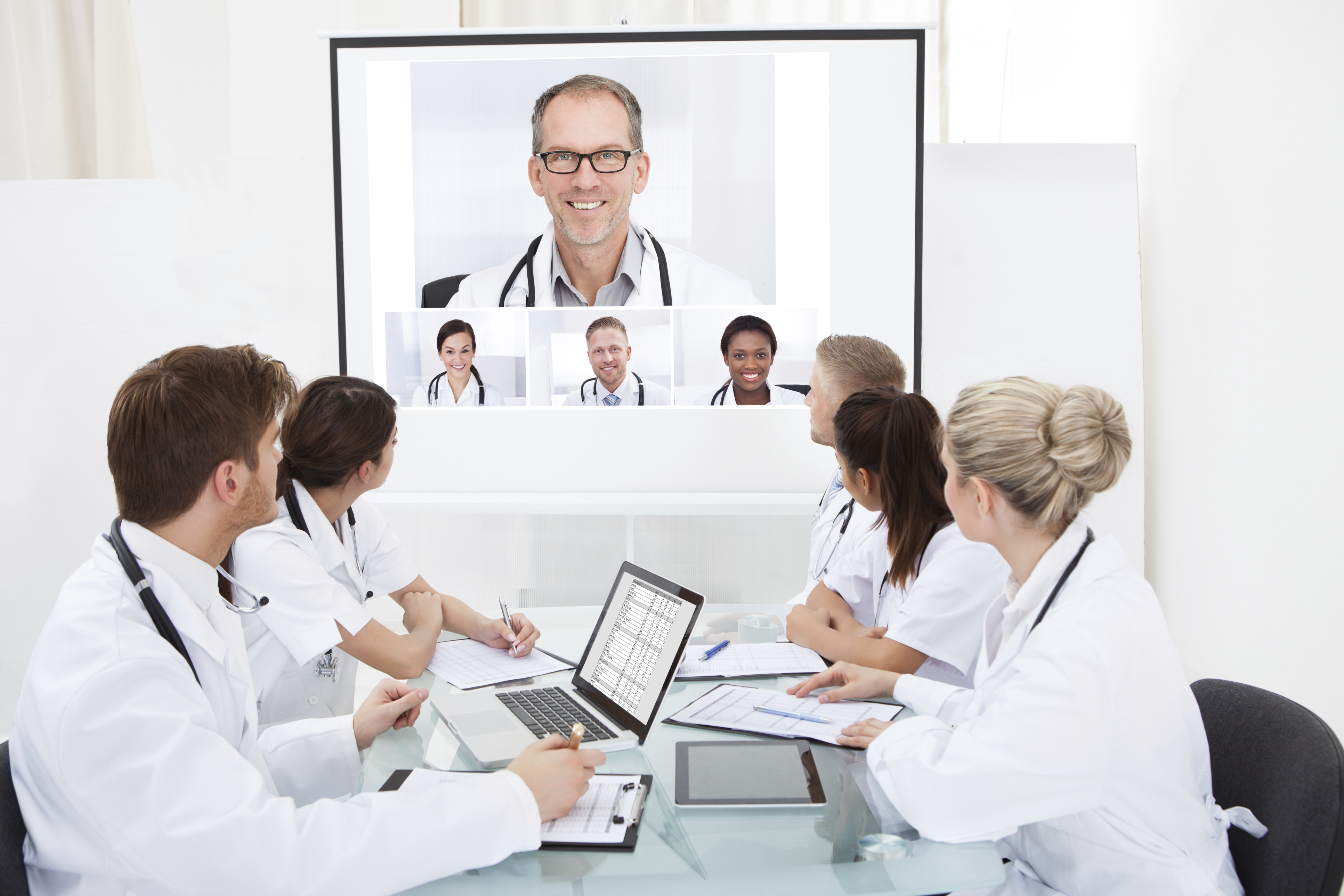 Doctors watching a presentation about doctors