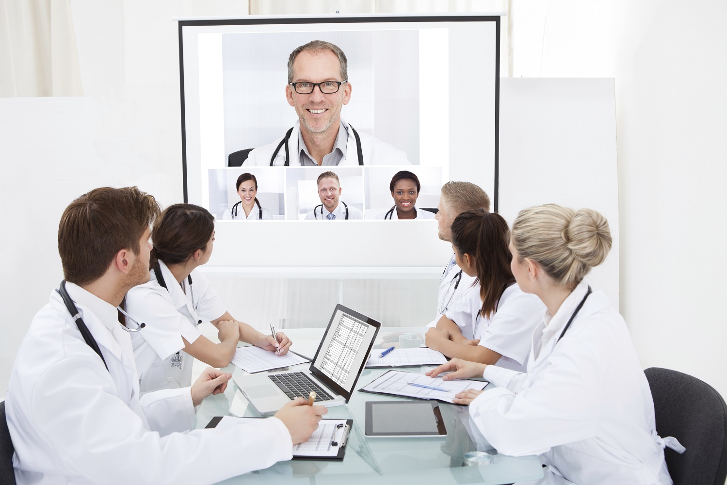 Doctors watching a presentation about doctors