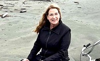 Portrait of smiling woman on a beach