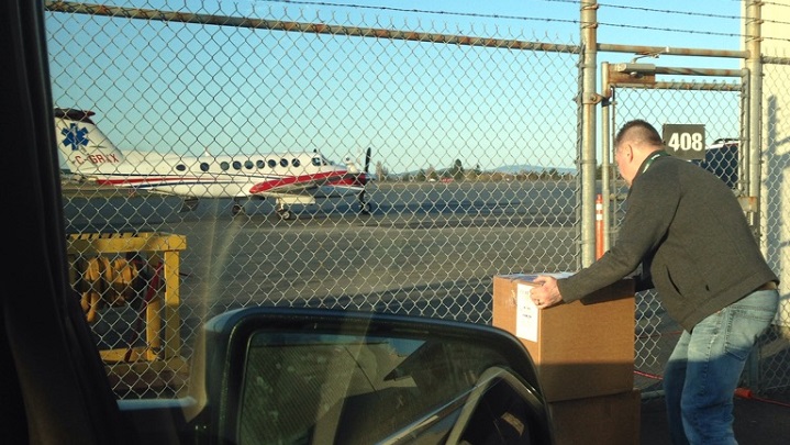 Mike Schenkers, a supply chain manager, helped get the shipment to the Victoria Airport.