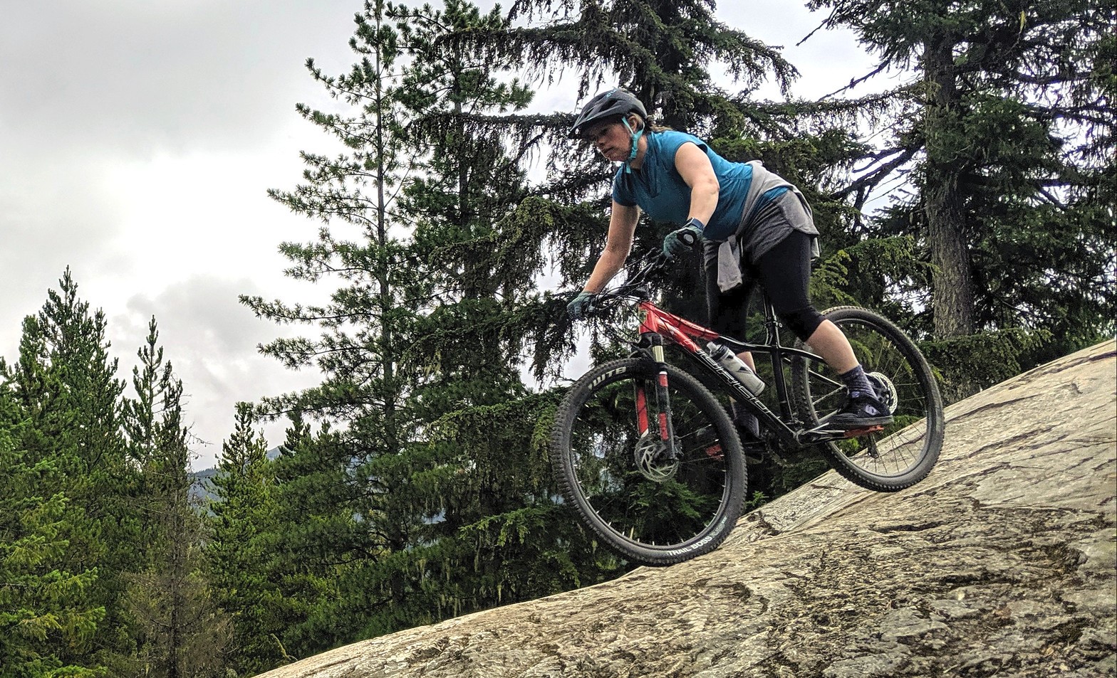 woman mountain biking